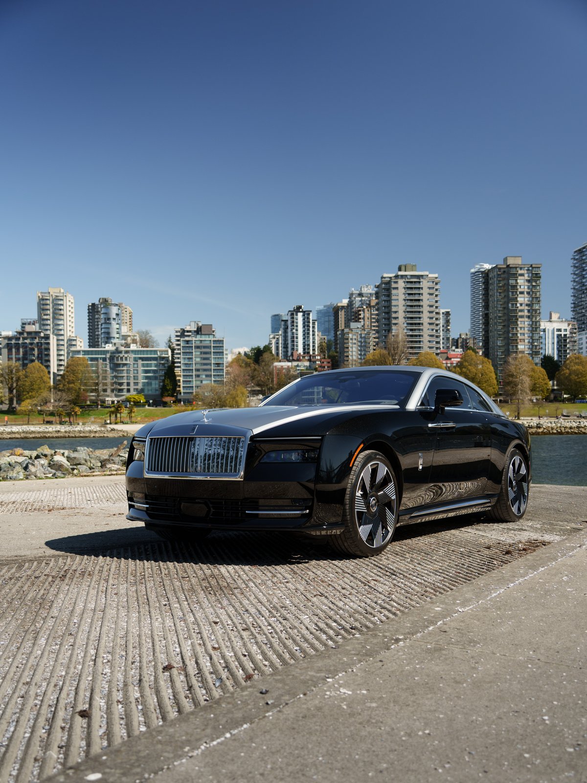 Rolls-Royce Spectre parked at the water's edge in Vancouver